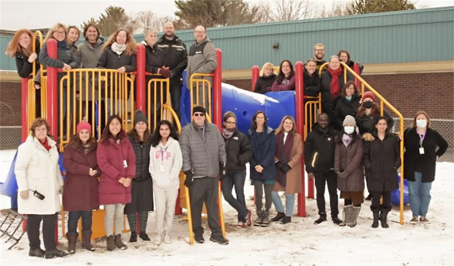 The Briargreen staff pose for a picture in the playground.